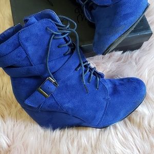 Blue wedge booties